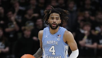 Jan 28, 2025; Pittsburgh, Pennsylvania, USA;  North Carolina Tar Heels guard RJ Davis (4) dribbles against the Pittsburgh Panthers during the second half at the Petersen Events Center. Mandatory Credit: Charles LeClaire-Imagn Images
