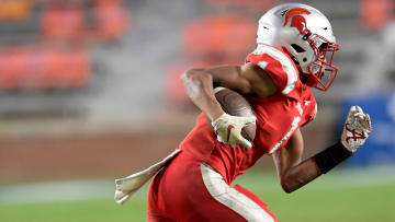 Saraland's Ryan Williams carries against Mountain Brook in the AHSAA Class 6A State Football Championship Game at Jordan Hare Stadium in Auburn, Ala., on Friday December 2, 2022.

Ms38