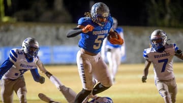Highland Home's Jakaleb Faulk (5) carries the ball against Clarke County during their playoff game on the Highland Home campus in Highland Home, Ala. on Friday evening November 18, 2022.

Hh30