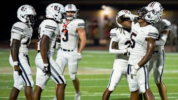 Pike Road's Braylon Outlaw (5) celebrates making an interception against Wetumpka during their game in Wetumpka, Ala., on Friday September 12, 2025.
