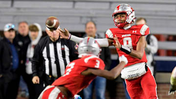 Saraland's KJ Lacey passes against Mountain Brook during the AHSAA Class 6A State Football Championship Game at Jordan Hare Stadium in Auburn, Ala., on Friday December 2, 2022.