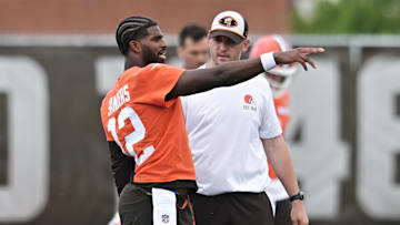 Jun 10, 2025; Berea, OH, USA; Cleveland Browns quarterback Shedeur Sanders (12) talks to Cleveland Browns offensive coordinator Tommy Rees during minicamp at CrossCountry Mortgage Campus. Mandatory Credit: Ken Blaze-Imagn Images