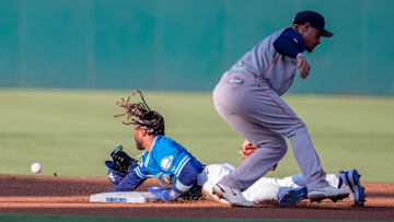 Oklahoma City outfielder Justin Dean (3) steals second base past Sugar Land infielder Edwin Díaz (31) during a minor league baseball game between the Oklahoma City Comets and the Sugar Land Space Cowboys at Chickasaw Bricktown Ballpark in Oklahoma City, on July 10.
