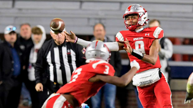 Saraland's KJ Lacey passes against Mountain Brook during the AHSAA Class 6A State Football Championship Game in 2022.