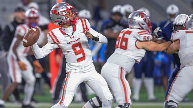 Saraland's Karle Lacey, Jr., (9) throws an early touchdown pass against Clay-Chalkville during the AHSAA Class 6A football state championship game at Bryant Denny Stadium in Tuscaloosa, Ala., on Friday December 8, 2023.