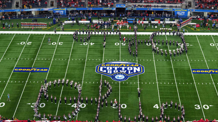 Dec 29, 2023; Arlington, TX, USA; The Ohio State Buckeyes marching band spells out the word Ohio as they perform before the game between the Ohio State Buckeyes and the Missouri Tigers at AT&T Stadium. Mandatory Credit: Jerome Miron-USA TODAY Sports