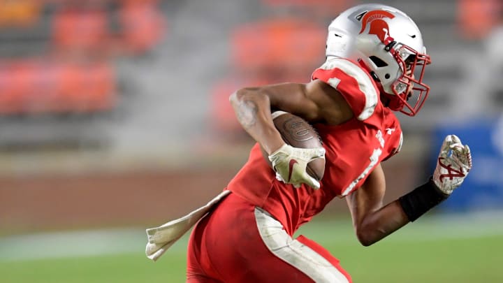 Saraland's Ryan Williams carries against Mountain Brook in the AHSAA Class 6A State Football Championship Game at Jordan Hare Stadium in Auburn, Ala., on Friday December 2, 2022.

Ms38