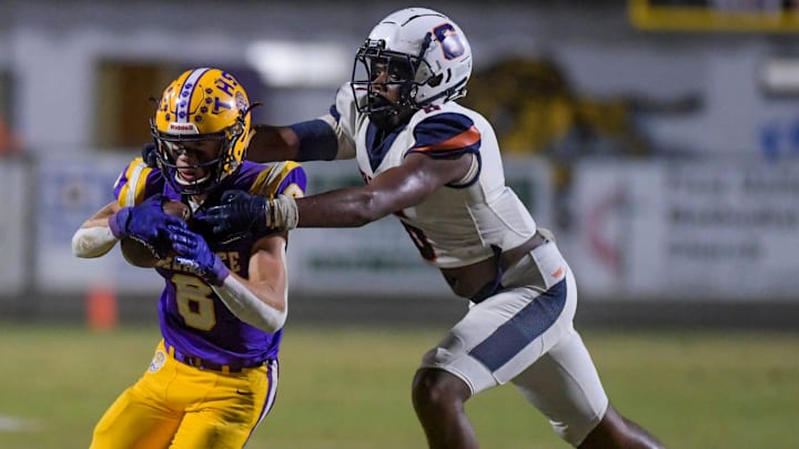 Charles Henderson's Zion Grady (6) stops Tallassee's Cade Everson (8) during their game in Tallassee, Ala. on Friday evening November 11, 2022.

Tall04