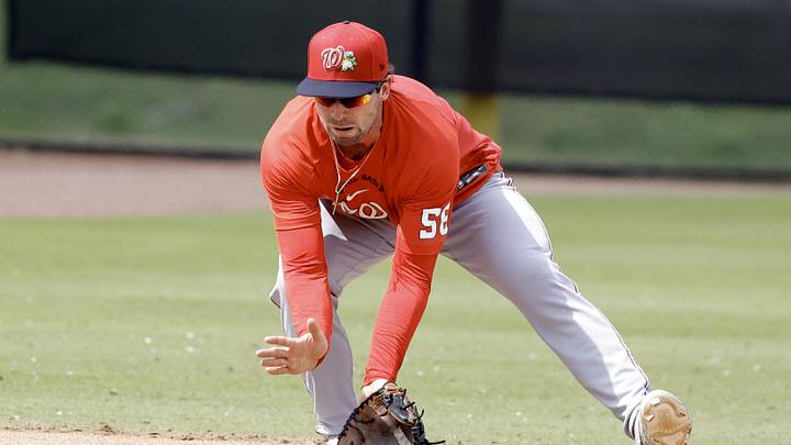 Feb 19, 2026; West Palm Beach, FL, USA;  Washington Nationals infielder Cayden Wallace (56) fields the ball during spring training workouts at CACTI Park of the Palm Beaches. Mandatory Credit: Reinhold Matay-Imagn Images