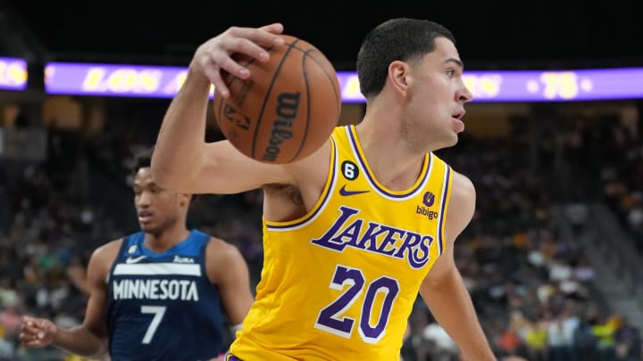 Oct 6, 2022; Las Vegas, Nevada, USA; Los Angeles Lakers forward Cole Swider (20) dribbles against the Minnesota Timberwolves during a preseason game at T-Mobile Arena. Mandatory Credit: Stephen R. Sylvanie-USA TODAY Sports