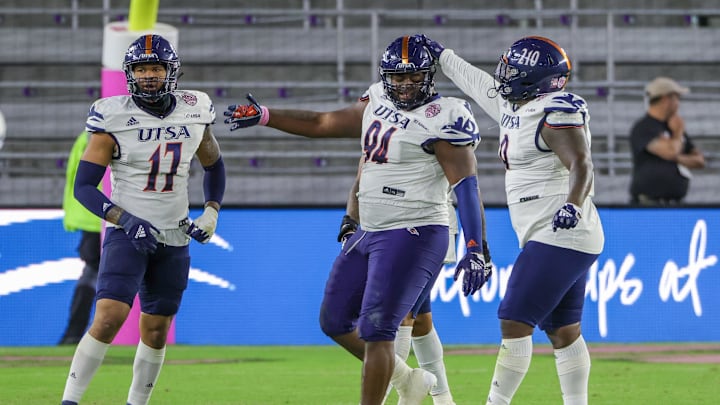 Dec 16, 2022; Orlando, Florida, USA; UTSA Roadrunners defensive lineman Joe Evans (94) celebrates with teammates after sacking Troy Trojans quarterback Gunnar Watson (18) during the second half at Exploria Stadium.