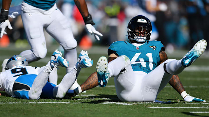 Jacksonville Jaguars linebacker Josh Allen (41) lets out a celebratory yell after his late second quarter sack on Carolina Panthers quarterback Bryce Young (9). The Jacksonville Jaguars hosted the Carolina Panthers at EverBank Stadium in Jacksonville, FL Sunday, December 31, 2023. The Jaguars went in at the half with a 9 to 0 lead. [Bob Self/Florida Times-Union]