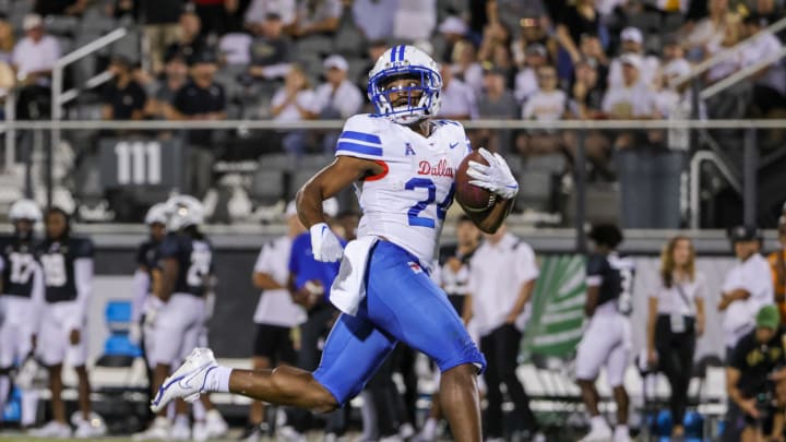 Oct 5, 2022; Orlando, Florida, USA; Southern Methodist Mustangs running back Velton Gardner (24) scores a touchdown during the first quarter against the UCF Knights at FBC Mortgage Stadium. Mandatory Credit: Mike Watters-USA TODAY Sports