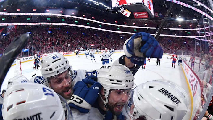 May 1, 2026; Montreal, Quebec, CAN; Tampa Bay Lightning forward Gage Goncalves (93) celebrates with teammates after scoring the winning goal against the Montreal Canadiens during the overtime period in game six of the first round of the 2026 Stanley Cup Playoffs at the Bell Centre. Mandatory Credit: Eric Bolte-Imagn Images