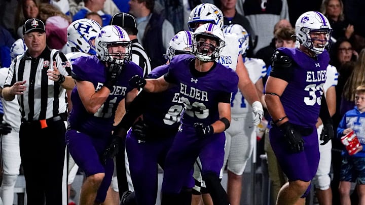 Elder Panthers celebrate after gaining possession of the ball in the first half of a high school football game between the Elder Panthers and Highlands Bluebirds, Friday, Oct. 10, 2025, at The Pit in Cincinnati.