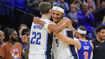 Dec 29, 2023; Orlando, Florida, USA; Orlando Magic forward Franz Wagner (22) and forward Paolo Banchero (5) celebrate their 117-108 win against the New York Knicks at KIA Center. Mandatory Credit: Mike Watters-Imagn Images