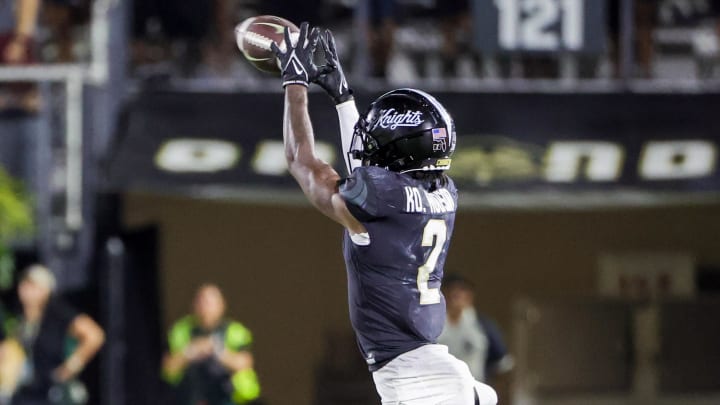 Sep 16, 2023; Orlando, Florida, USA; UCF Knights wide receiver Kobe Hudson (2) catches a pass during the second quarter against the Villanova Wildcats at FBC Mortgage Stadium. Mandatory Credit: Mike Watters-USA TODAY Sports