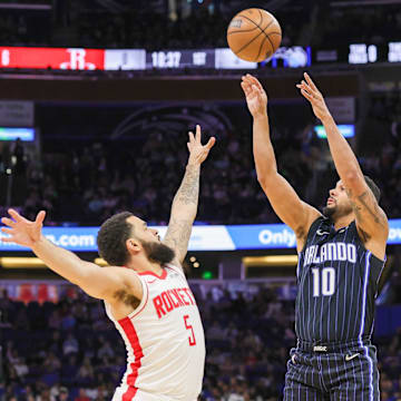Orlando Magic guard Cory Joseph (10) shoots over Houston Rockets guard Fred VanVleet (5) during the first quarter at Kia Center.