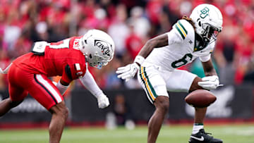 Baylor Bears wide receiver Ashtyn Hawkins (6) fumbles the ball in the second quarter of a NCAA men’s football game between the Cincinnati Bearcats and Baylor Bears, Saturday, Oct. 25, 2025, at Nippert Stadium in Cincinnati.