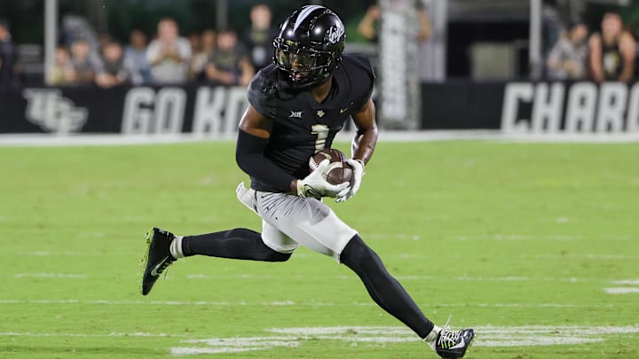 Sep 16, 2023; Orlando, Florida, USA; UCF Knights wide receiver Javon Baker (1) runs the ball against Sep 16, 2023; Orlando, Florida, USA; UCF Knights wide receiver Javon Baker (1) runs the ball against