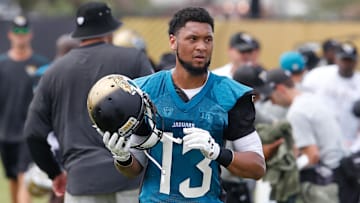 Jul 27, 2017; Jacksonville, FL, USA; Jacksonville Jaguars wide receiver Rashad Greene Sr. (13) rests during drills at the Jacksonville Jaguars training camp on the NFL Football Practice Fields at EverBank Field. Mandatory Credit: Reinhold Matay-Imagn Images