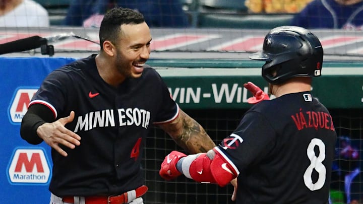 Sep 5, 2023; Cleveland, Ohio, USA; Minnesota Twins catcher Christian Vazquez (8) celebrates with shortstop Carlos Correa (4) after hitting a home run during the sixth inning against the Cleveland Guardians at Progressive Field. Mandatory Credit: Ken Blaze-Imagn Images