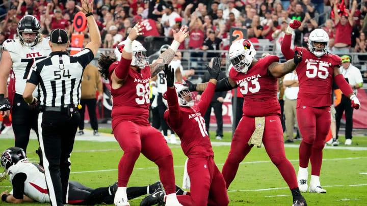 Arizona Cardinals linebacker BJ Ojulari (18) reacts after sacking Atlanta Falcons quarterback Taylor Heinicke (4) in the second half at State Farm Stadium in Glendale on Nov. 12, 2023.