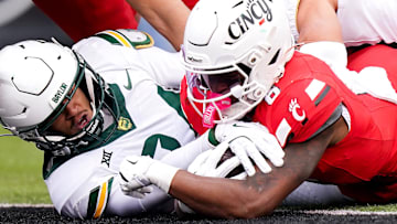Cincinnati Bearcats running back Evan Pryor (6) scores a touchdown in the first quarter of a NCAA men’s football game between the Cincinnati Bearcats and Baylor Bears, Saturday, Oct. 25, 2025, at Nippert Stadium in Cincinnati.