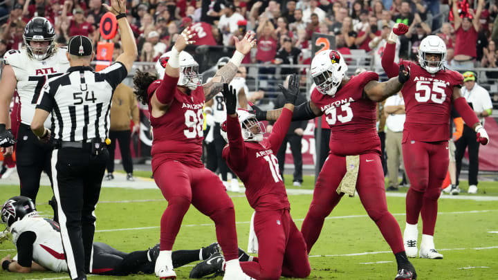 Arizona Cardinals linebacker BJ Ojulari (18) reacts after sacking Atlanta Falcons quarterback Taylor Heinicke (4) in the second half at State Farm Stadium on Nov. 12, 2023, in Glendale.