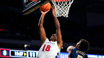 Cincinnati Bearcats forward Baba Miller (18) hits a layup in the first half of a NCAA men’s basketball game between the Cincinnati Bearcats and Mount St. Mary’s Mountaineers, Sunday, Nov. 16, 2025, at Fifth Third Arena in Cincinnati.
