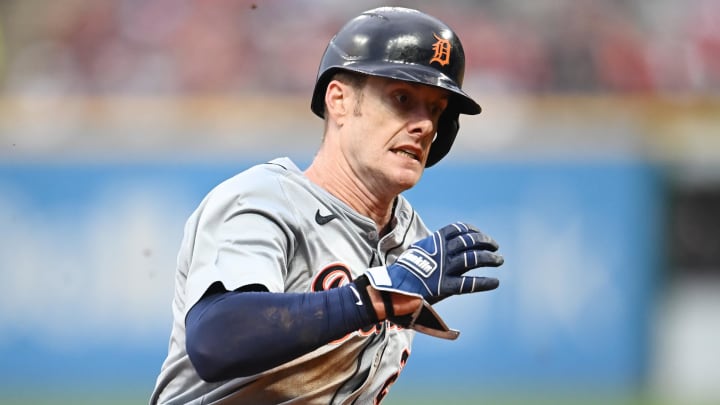 Jul 22, 2024; Cleveland, Ohio, USA; Detroit Tigers left fielder Mark Canha (21) rounds third base en route to scoring during the sixth inning against the Cleveland Guardians at Progressive Field.