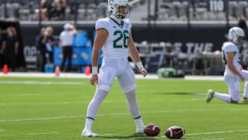Sep 30, 2023; Orlando, Florida, USA; Baylor Bears long snapper Garrison Grimes (26) warms up before the game against the UCF Knights at FBC Mortgage Stadium. Mandatory Credit: Mike Watters-Imagn Images