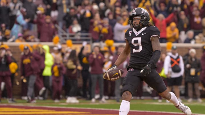 Oct 28, 2023; Minneapolis, Minnesota, USA; Minnesota Golden Gophers wide receiver Daniel Jackson (9) scores a touchdown on a 22-yard pass reception against the Michigan State Spartans during the second quarter at Huntington Bank Stadium. Mandatory Credit: Nick Wosika-USA TODAY Sports