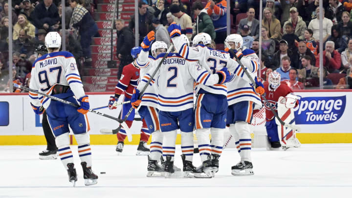 Jan 13, 2024; Montreal, Quebec, CAN; Edmonton Oilers defenseman Evan Bouchard (2) celebrates win