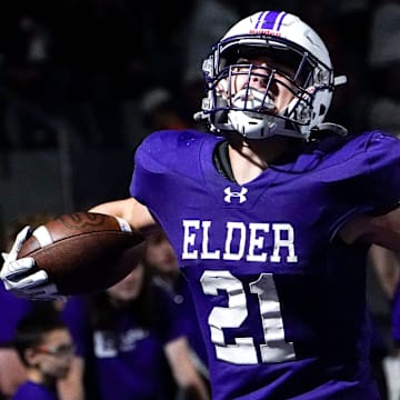 Elder Panthers running back Tommy Becker (21) celebrates after scoring a touchdown in the first half of a high school football game between the Elder Panthers and Highlands Bluebirds, Friday, Oct. 10, 2025, at The Pit in Cincinnati.