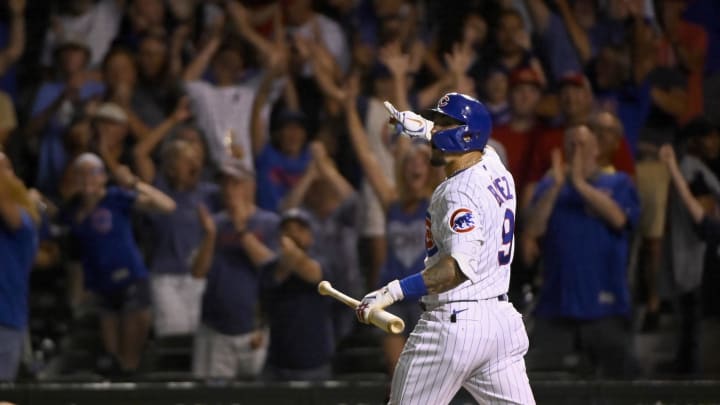 Jul 26, 2021; Chicago, Illinois, USA;  Chicago Cubs shortstop Javier Baez (9) reacts after hitting a walk-off single.