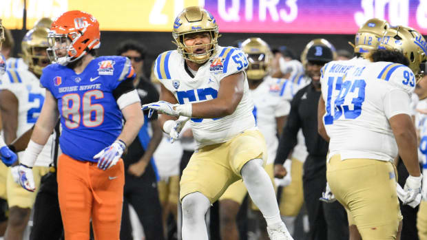 UCLA Bruins offensive lineman Khadere Kounta (53) celebrates after making a tackle against the Boise State Broncos in the thi