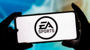 In this photo illustration a EA Sports logo seen displayed...