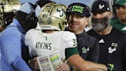 Nov 1, 2024; Boca Raton, Florida, USA;  South Florida Bulls head coach Alex Golesh congratulates South Florida Bulls wide receiver Sean Atkins (38) on a touchdown during the second half against the Florida Atlantic Owls at FAU Stadium. Mandatory Credit: Reinhold Matay-Imagn Images