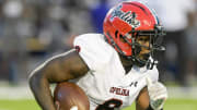 Opelika's Calvin Hughley, Jr., (6) carries the ball against Johnson Abernathy Graetz High School during their game at Cramton Bowl in Montgomery, Ala., on Thursday August 31, 2023.