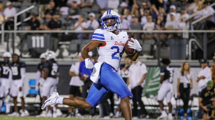 Oct 5, 2022; Orlando, Florida, USA; Southern Methodist Mustangs running back Velton Gardner (24) scores a touchdown during the first quarter against the UCF Knights at FBC Mortgage Stadium. Mandatory Credit: Mike Watters-USA TODAY Sports