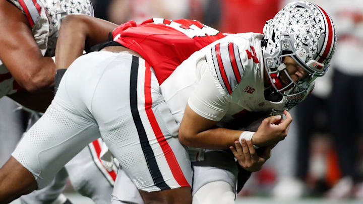 Georgia defensive lineman Mykel Williams (13) sacks Ohio State quarterback C.J. Stroud (7) during