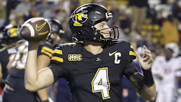 Sep 19, 2024; Boone, North Carolina, USA;  Appalachian State Mountaineers quarterback Joey Aguilar (4) throws a pass against the South Alabama Jaguars during the second quarter at Kidd Brewer Stadium. Mandatory Credit: Reinhold Matay-Imagn Images