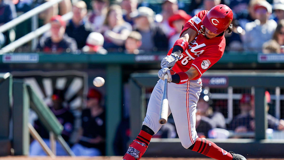 Cincinnati Reds shortstop Edwin Arroyo (56) hits the ball in the third inning of a Cactus League game between the Cincinnati Reds and Cleveland Guardians, Saturday, Feb. 21, 2026, at Goodyear Ballpark in Goodyear, Ariz.