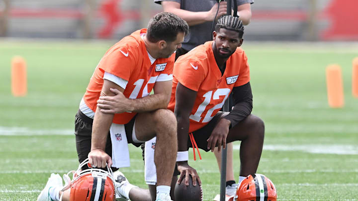 Cleveland Browns quarterback Joe Flacco (15) talks to quarterback Shedeur Sanders (12) during minicamp at CrossCountry Mortgage Campus.