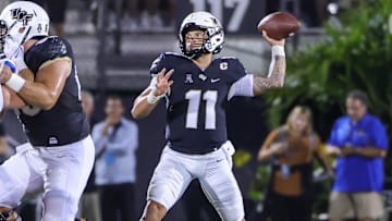 Sep 2, 2021; Orlando, Florida, USA; UCF Knights quarterback Dillon Gabriel (11) passes the ball against the Boise State Broncos during the second quarter at Bounce House. Mandatory Credit: Mike Watters-Imagn Images