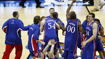 Apr 7, 2008; San Antonio, TX, USA; Members of the Kansas Jayhawks celebrate after defeating the Memphis Tigers in the finals of the 2008 NCAA Mens Final Four Championship at the Alamodome.  Kansas defeated Memphis 75-68 in overtime to win the national championship. 