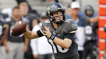 Nov 10, 2018; Orlando, FL, USA; UCF Knights quarterback McKenzie Milton (10) throws a pass during the first quarter against the Navy Midshipmen at Spectrum Stadium. Mandatory Credit: Reinhold Matay-Imagn Images