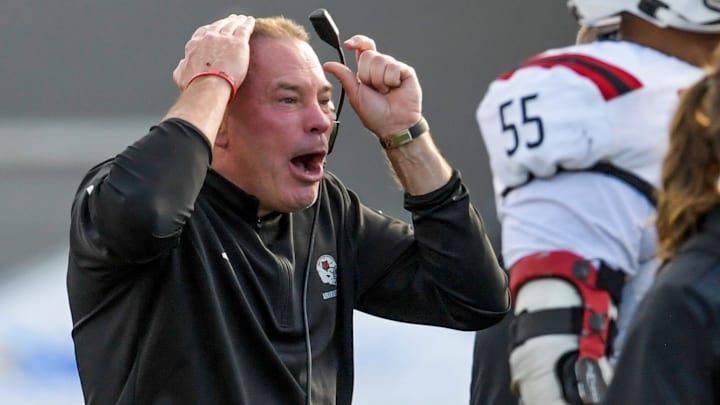 Arkansas State Red Wolves head coach Butch Jones coaches against the Northern Illinois Huskies in the Camellia Bowl at Cramton Bowl in Montgomery, Ala., on Saturday December 23, 2023.