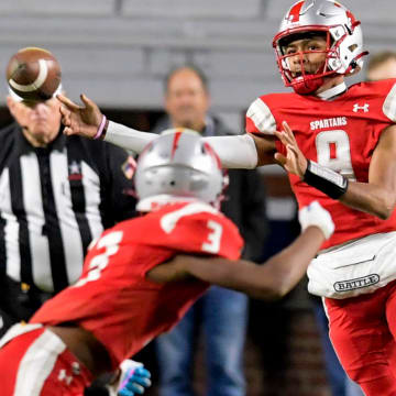 Saraland's KJ Lacey passes against Mountain Brook during the AHSAA Class 6A State Football Championship Game at Jordan Hare Stadium in Auburn, Ala., on Friday December 2, 2022.

Ms04